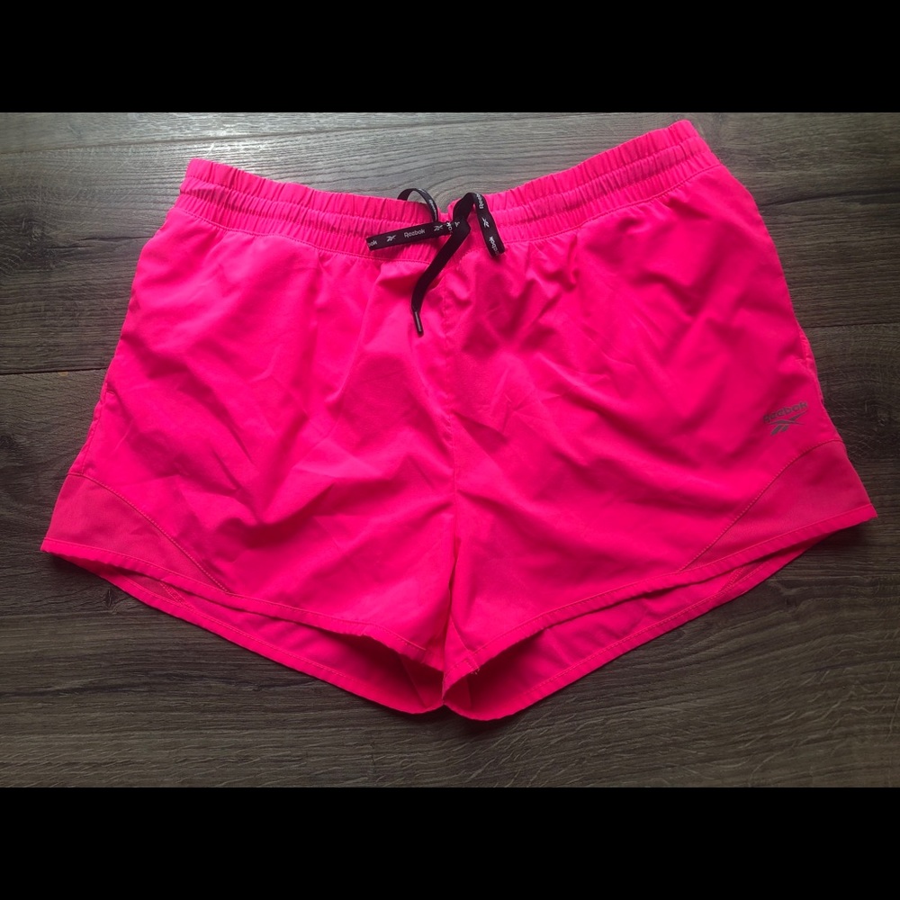 Bright pink Reebok athletic XL shorts